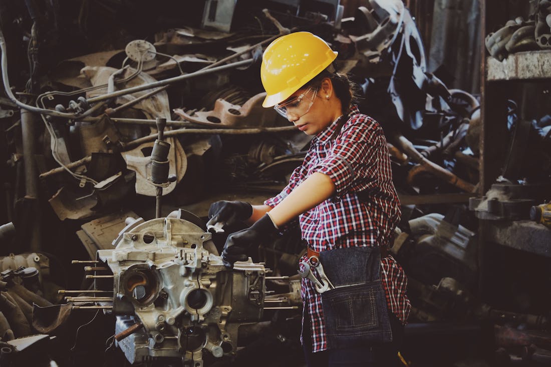 Manufacturing technician working on a component